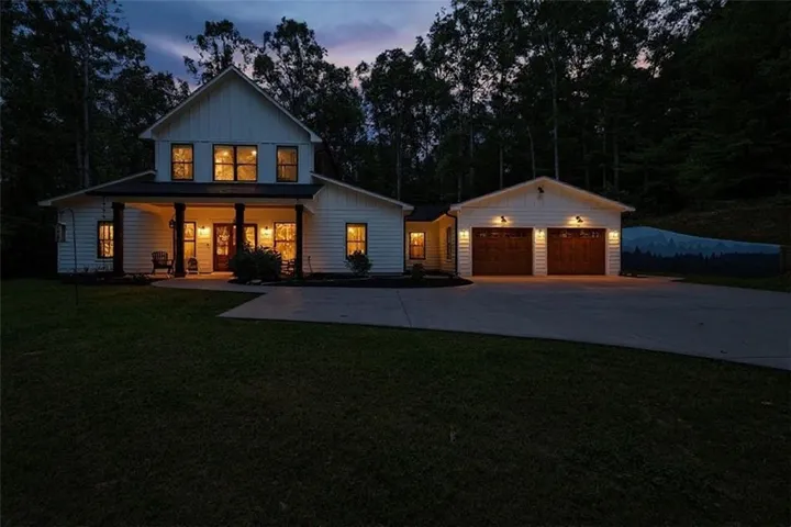 Modern farmhouse exterior with white board-and-batten siding