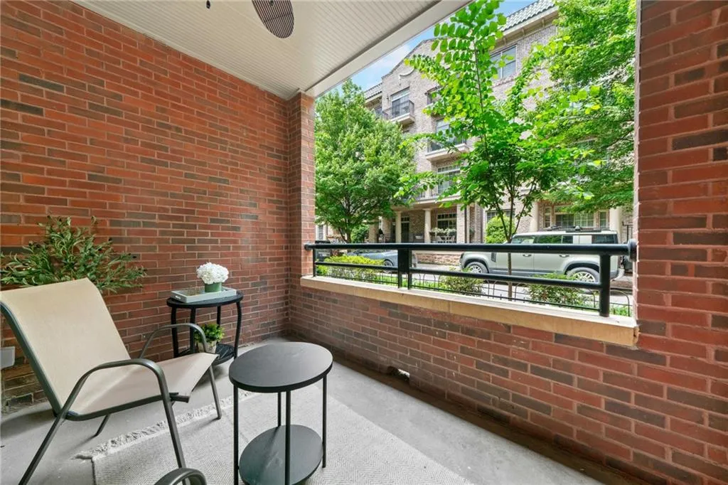 Balcony featuring a ceiling fan