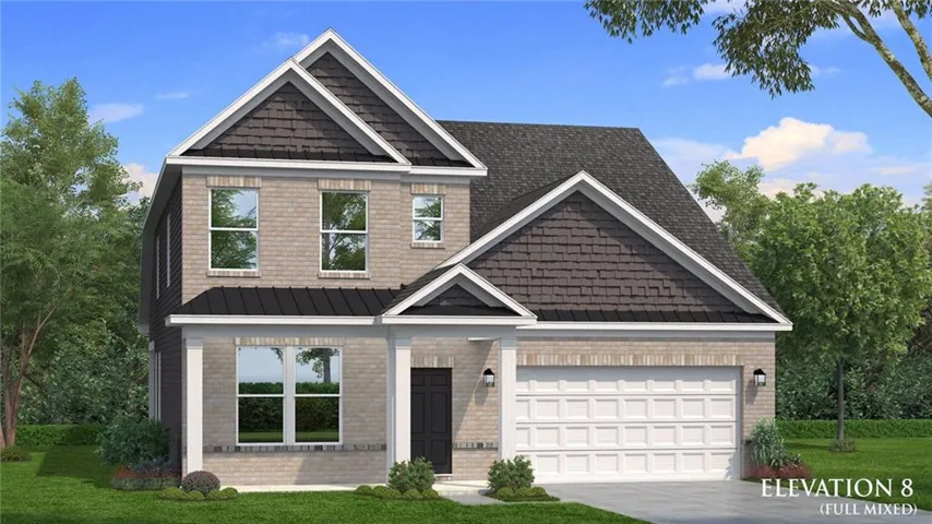 Two-story residence featuring light-colored brick and horizontal siding, a two-car garage with a panel door, a prominent front entrance with a dark door, and multiple windows