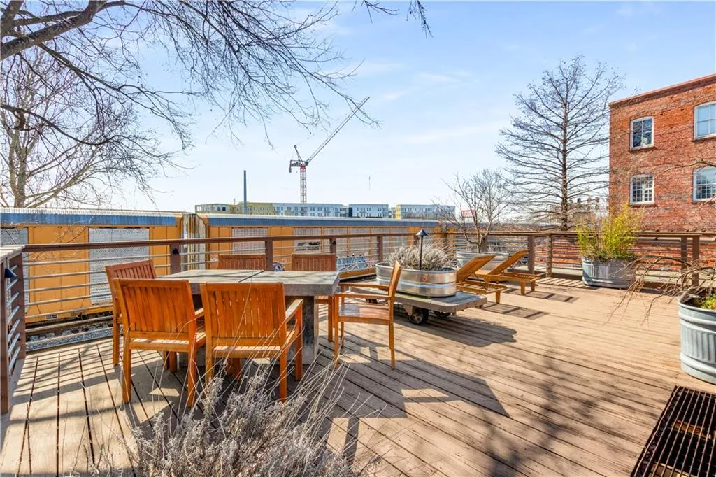 Wooden terrace with outdoor dining area