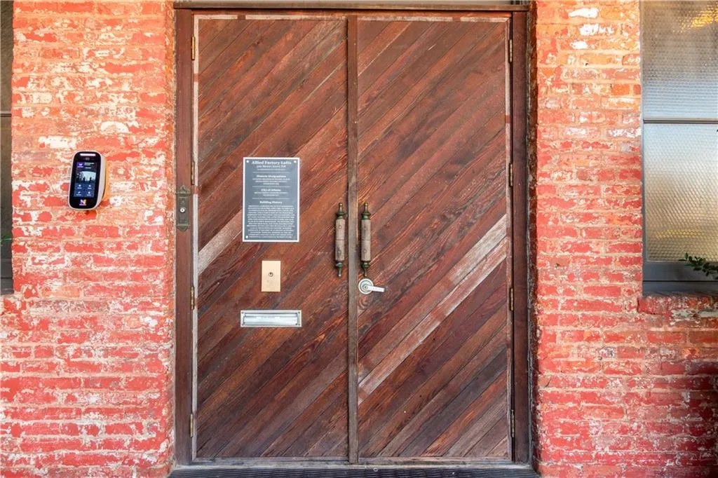 Property entrance with brick siding