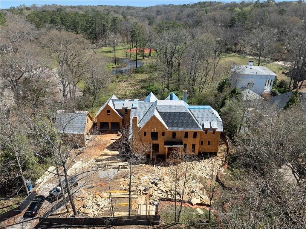 Bird's eye view featuring a wooded view