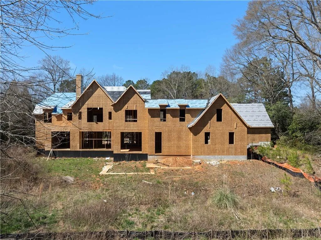 View of front of house with a chimney