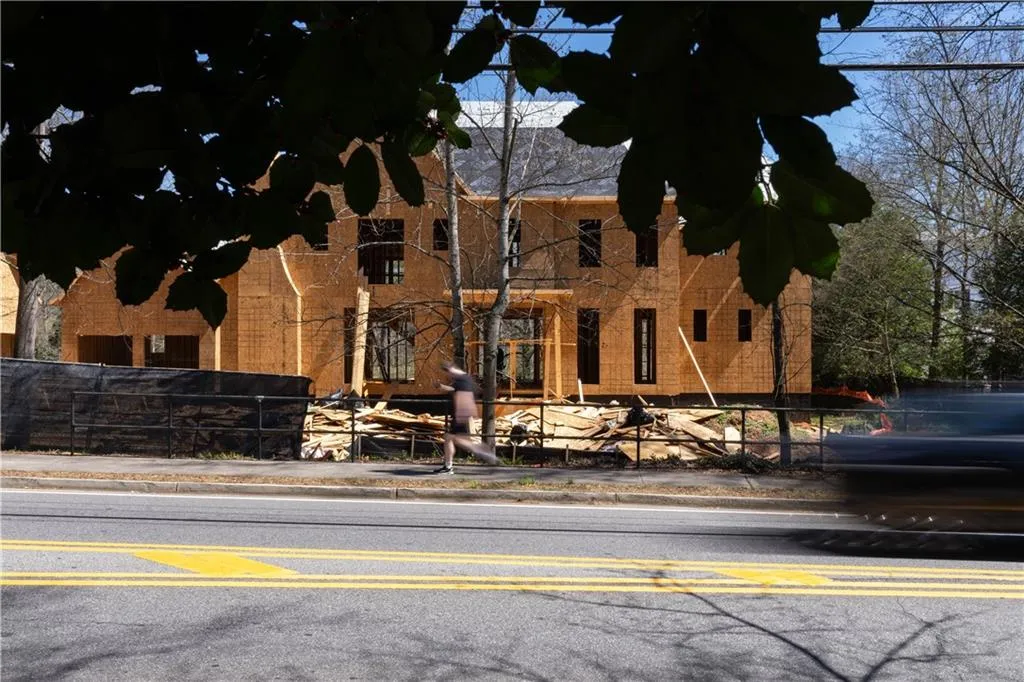 View of building exterior with fence