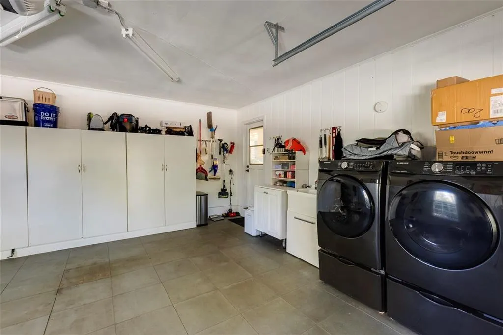 Laundry in Garage but Can Be Retrofitted & Put Back in Full Bath Off Kitchen + 2nd Laundry in Basement