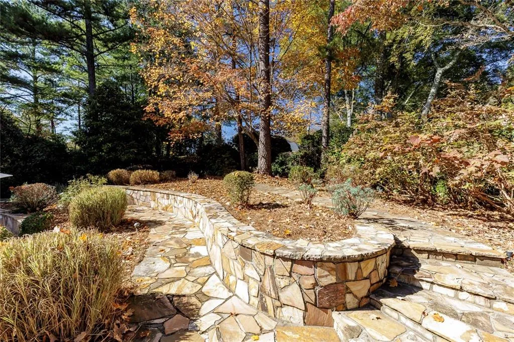 Extensive Stonework with Path to Sitting Area with Beautiful Private Views