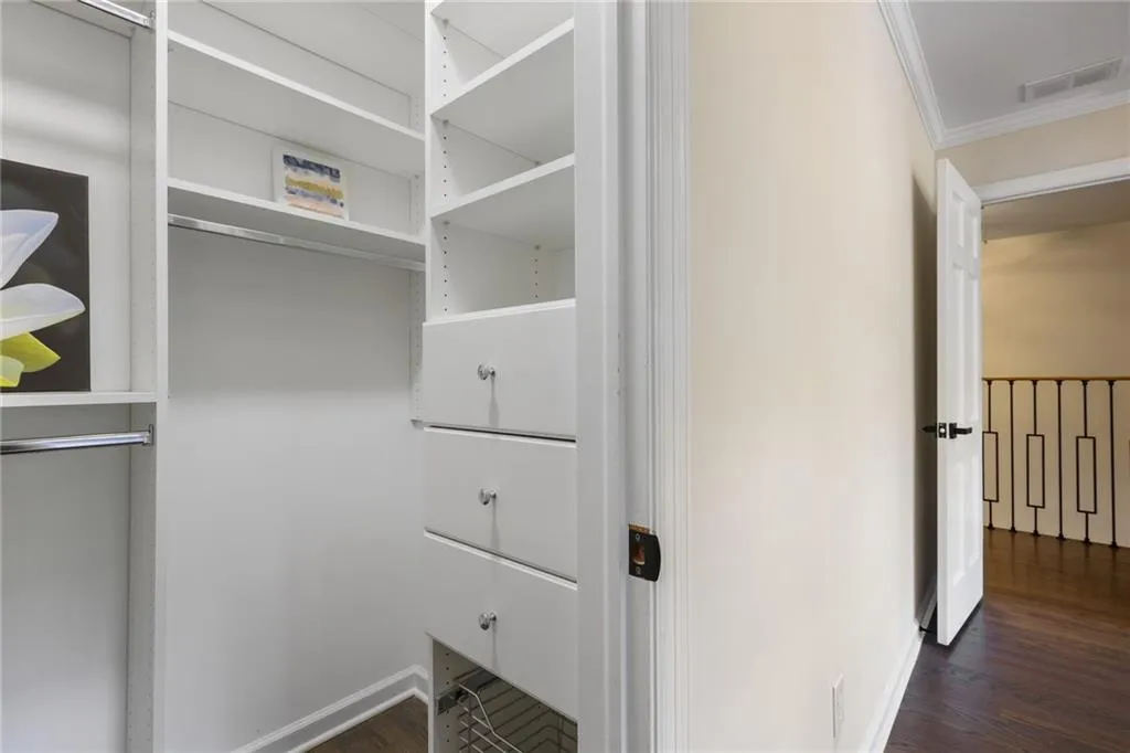 both bedroom have walk in custom closets