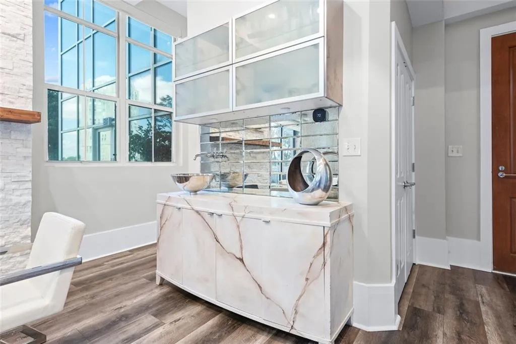Modern wet bar with vessel sink perfect for entertaining