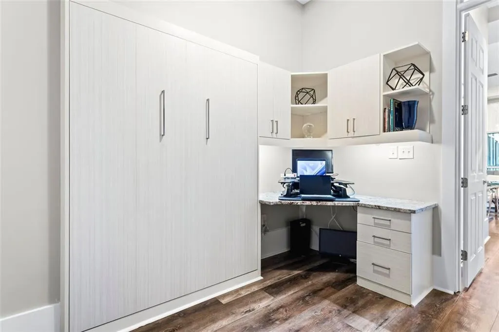 Murphy bed closed creates a spacious office for at home workers