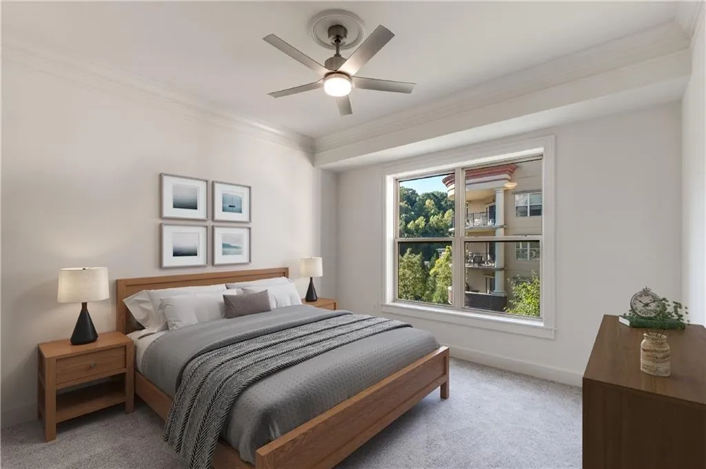 Second guest bedroom with lots of sunlight. All 3 bedrooms have newly installed fans!