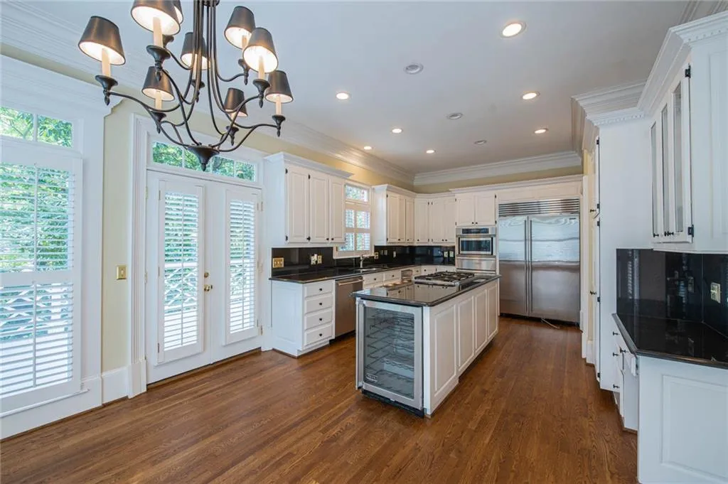 VIEW OF KITCHEN AND CENTER ISLAND