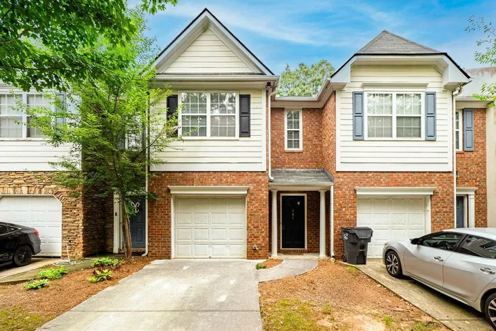 Brick and siding exterior with gabled roof lines
