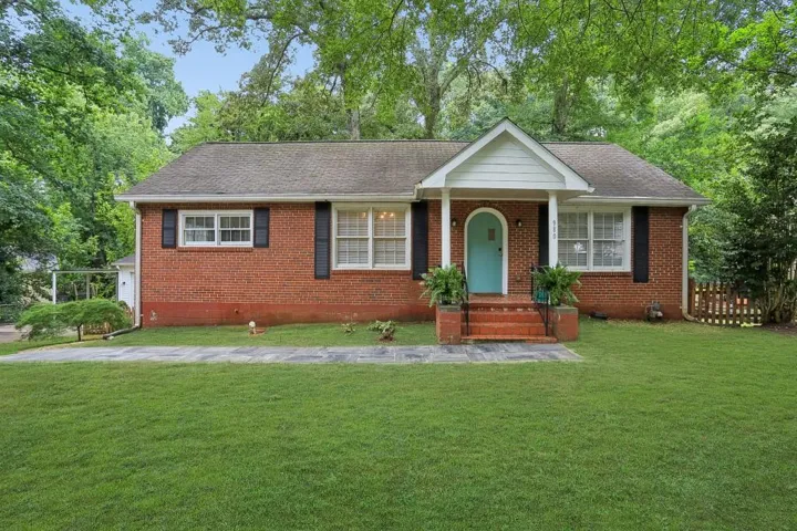 Completely Reimagined Brick Ranch with Exceptional Flexibility in the Heart of East Point!