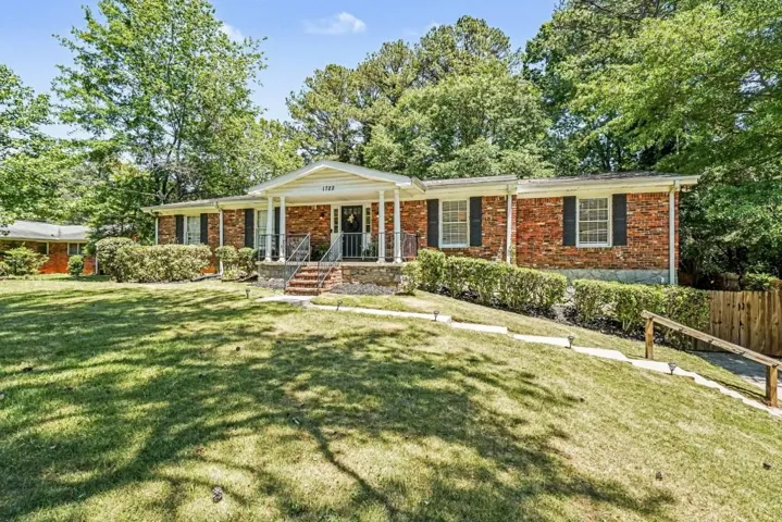 Four Sided Brick Ranch With Timeless Exterior And Strong Presence