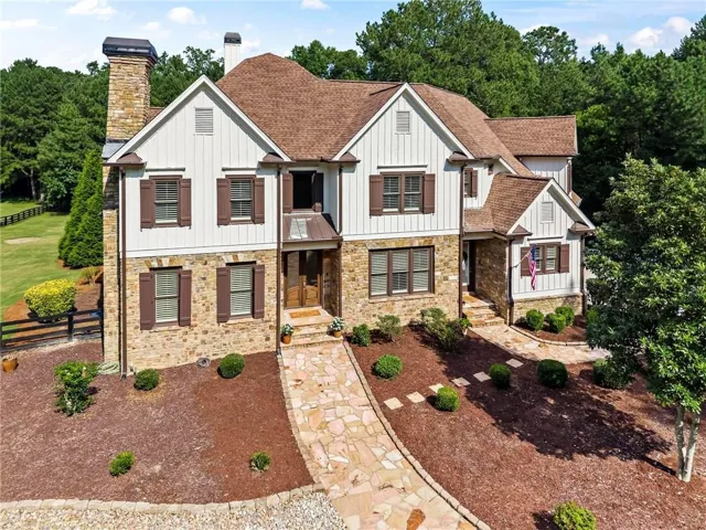 Architectural stone and board-and-batten exterior