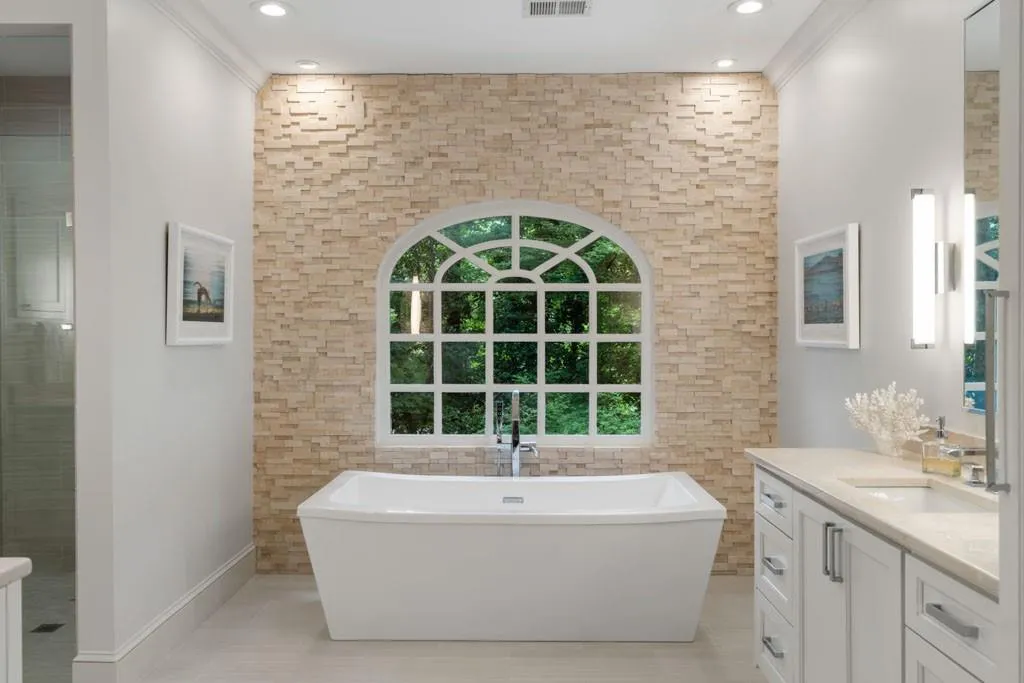 Primary bathroom with separate tub and shower