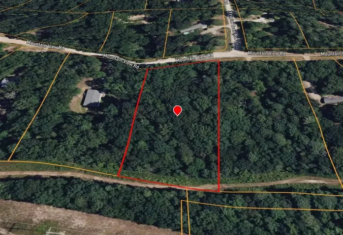 Aerial Map. Outlining the boundaries of the property and its surrounding land parcels