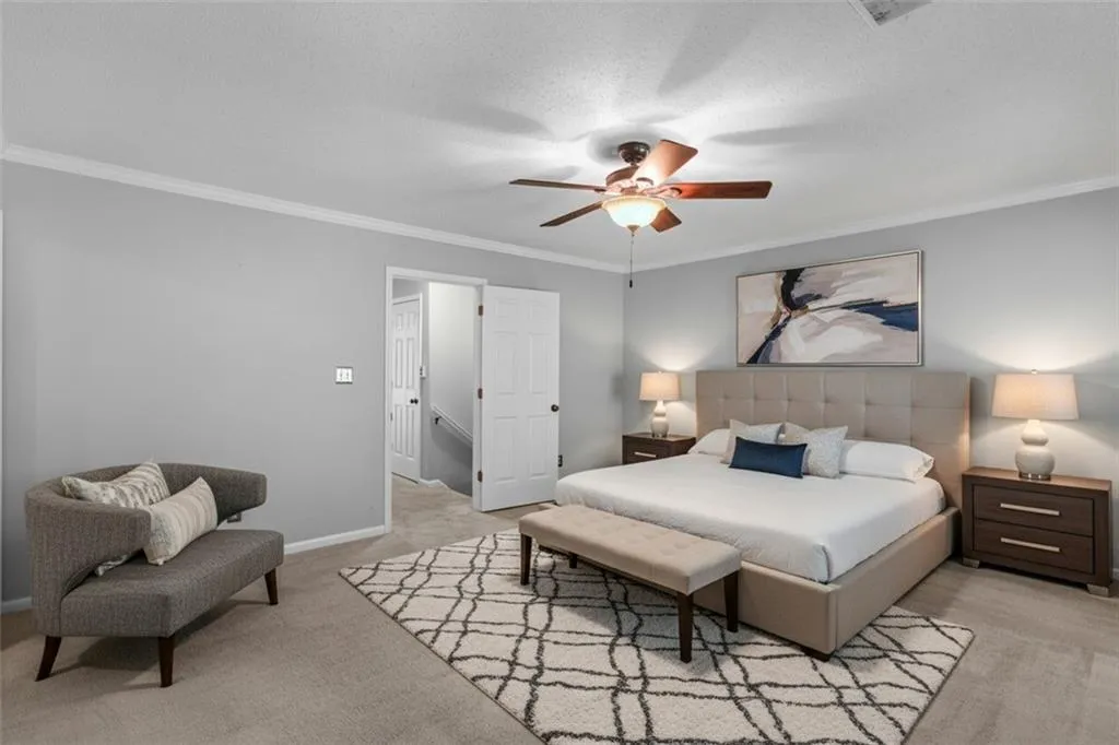 Virtually staged primary bedroom Virtually staged primary bedroom