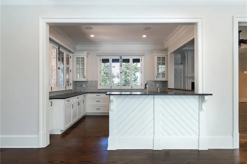 Extension of kitchen area that opens to patio