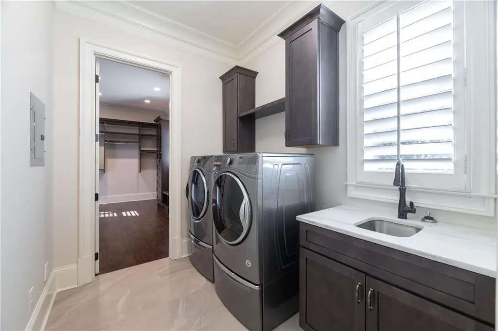 Private laundry room for primary suite