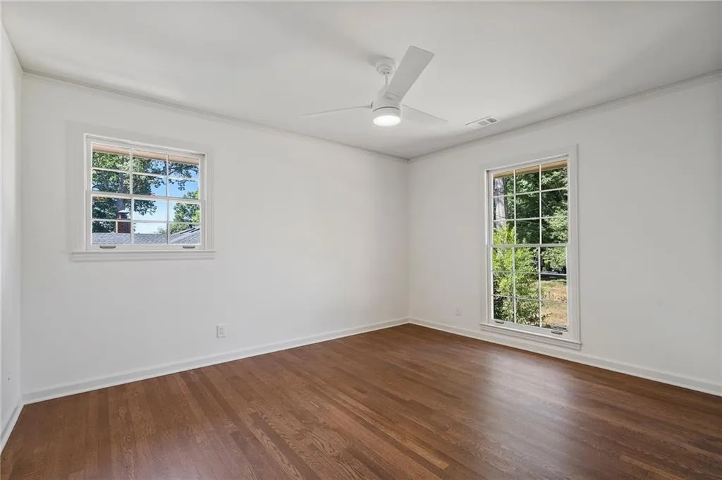 One of the two secondary bedrooms on the main floor