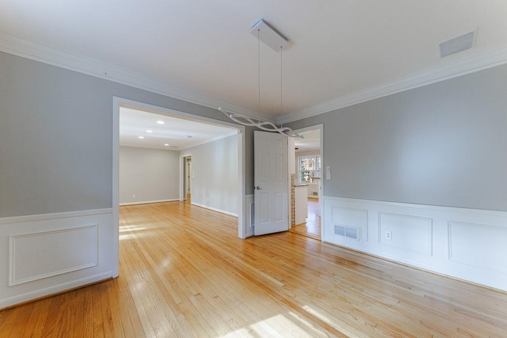Dining room opens to the living room and a door to the kitchen