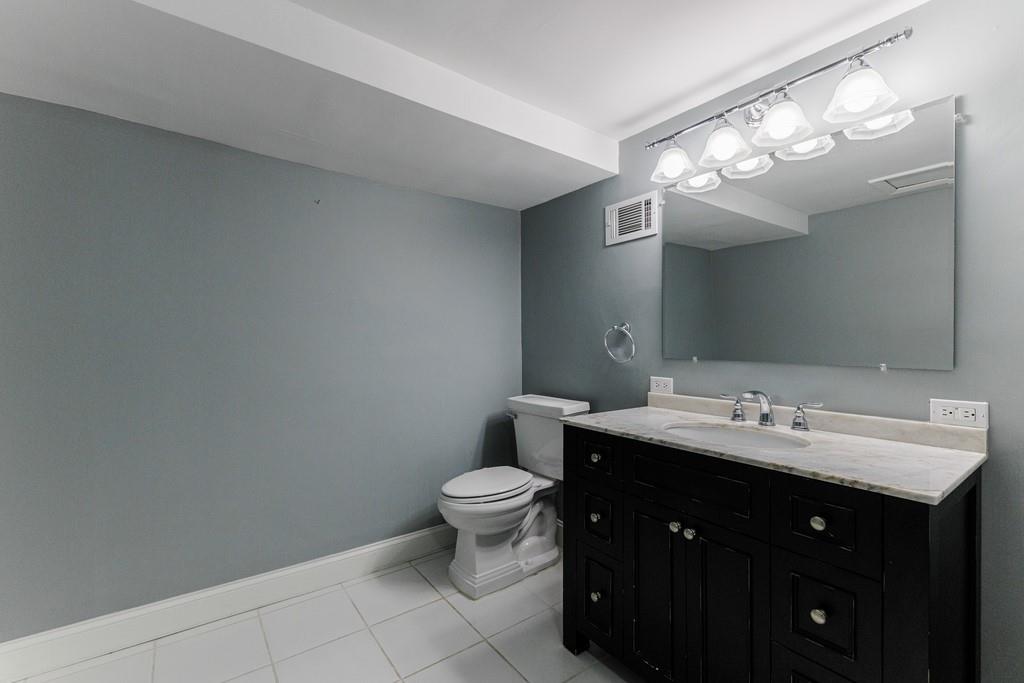 3rd full bathroom is on the lower level