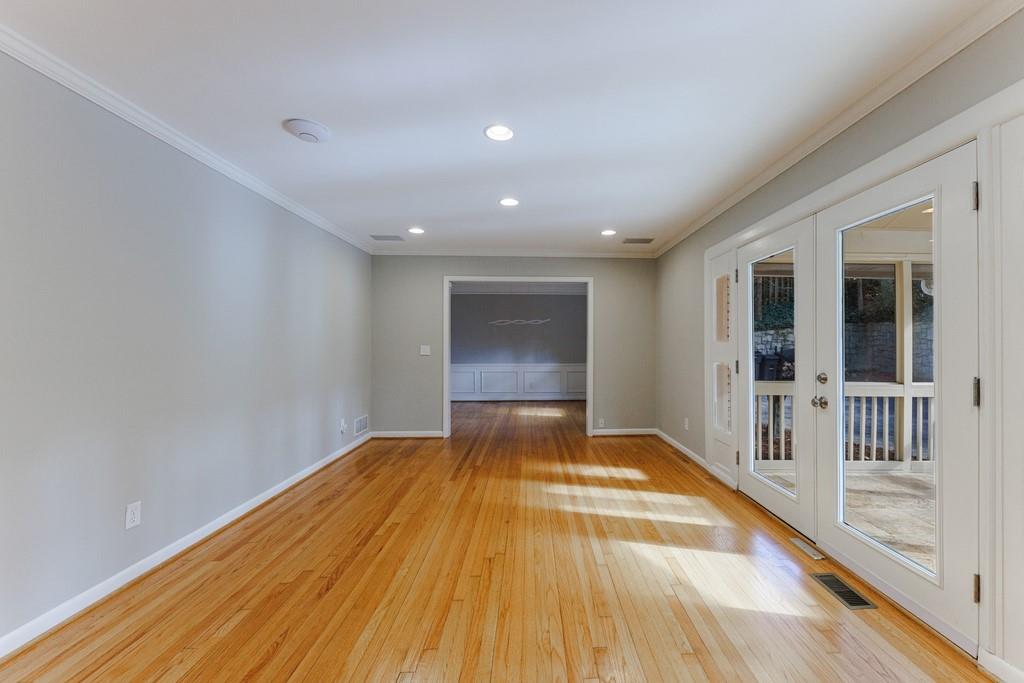 Large separate living room with view to the separate dining room