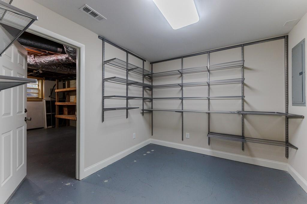 Huge storage room with built-in shelving units