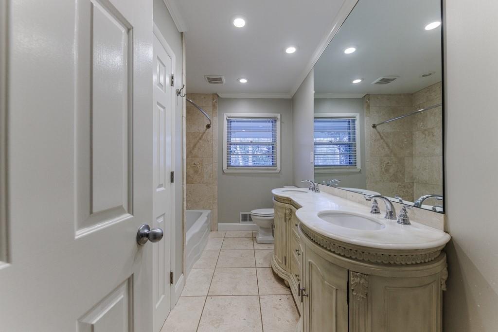 Full bathroom on the main level with double vanity