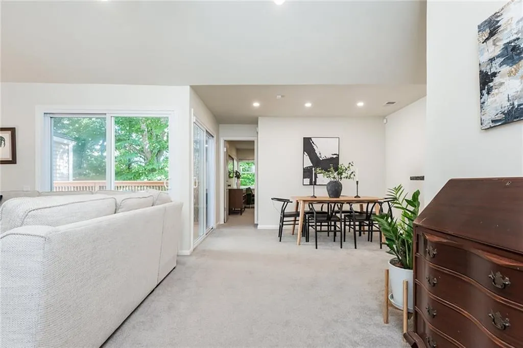 Living room with light carpet
