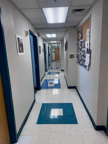 Hallway to offices, examination rooms, storage, etc,