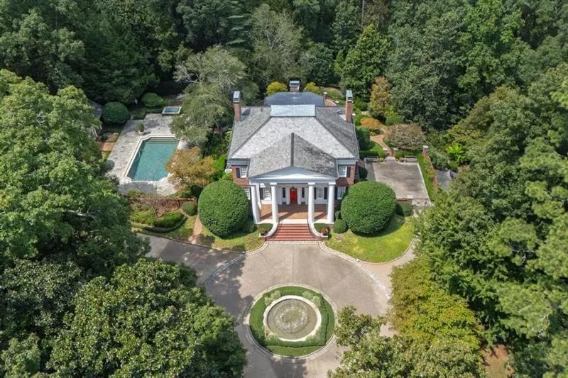 12.5 acres in the middle of Buckhead with pool, guest house and tennis court.