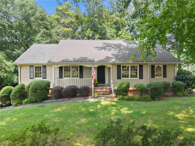 Home with front porch and beautiful harwoods
