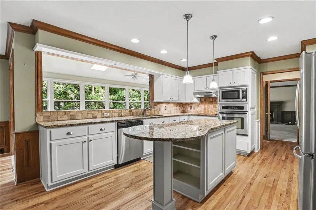 Kitchen View Into Sunroom