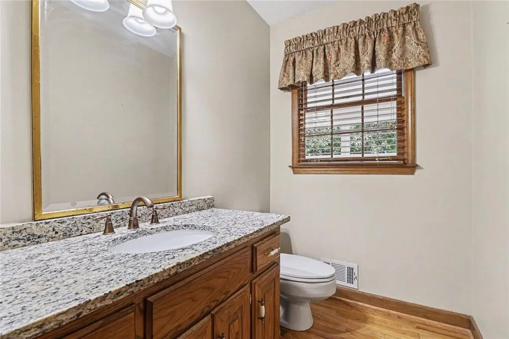 Main Level Half Bath with Granite
