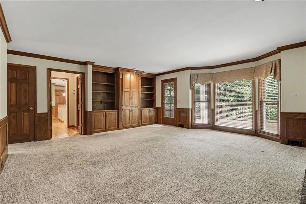 Another View of Family Room with Built-In Bookshelves & Wet Bar