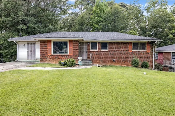 Brick exterior with white siding accents