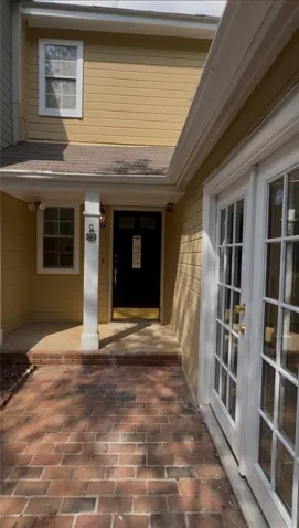 Doorway to property with a patio and french doors