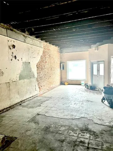 High Ceilings and Exposed Brick provide Excellent Character for your new space!