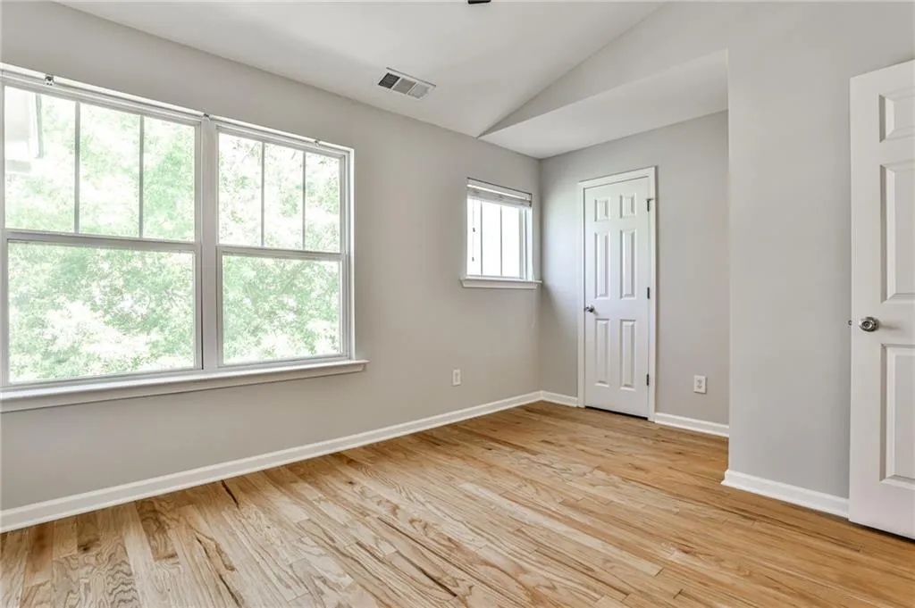 Upstairs Bedroom with vaulted ceilings - Also serves as a second primary