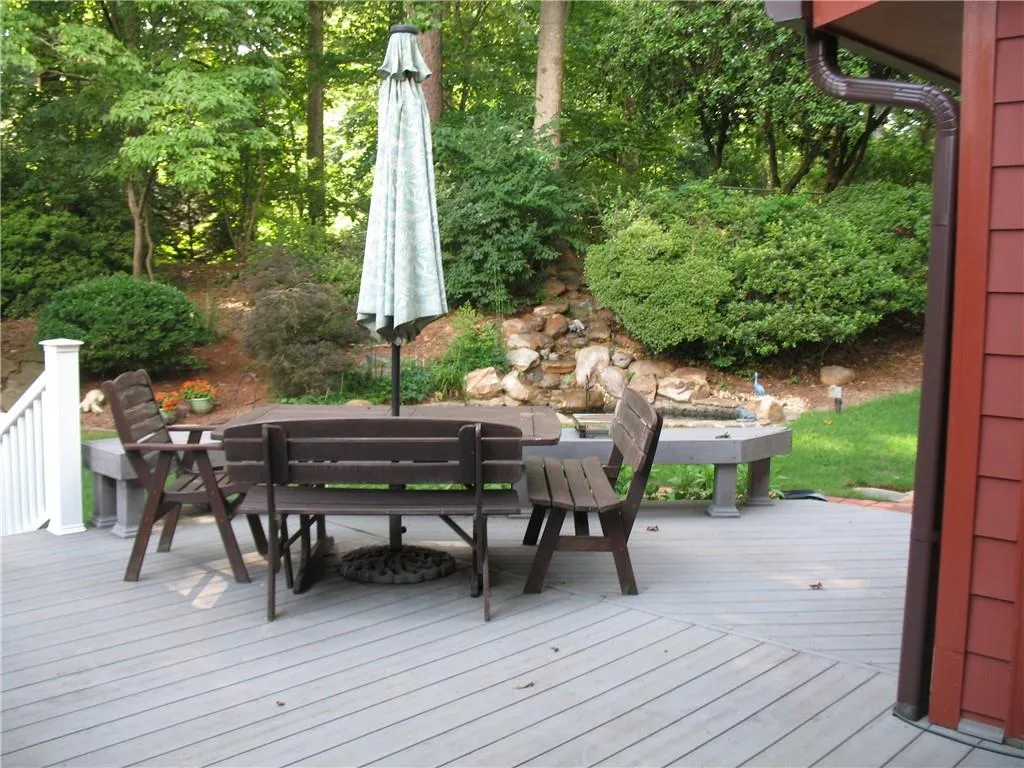 Deck with view of pond