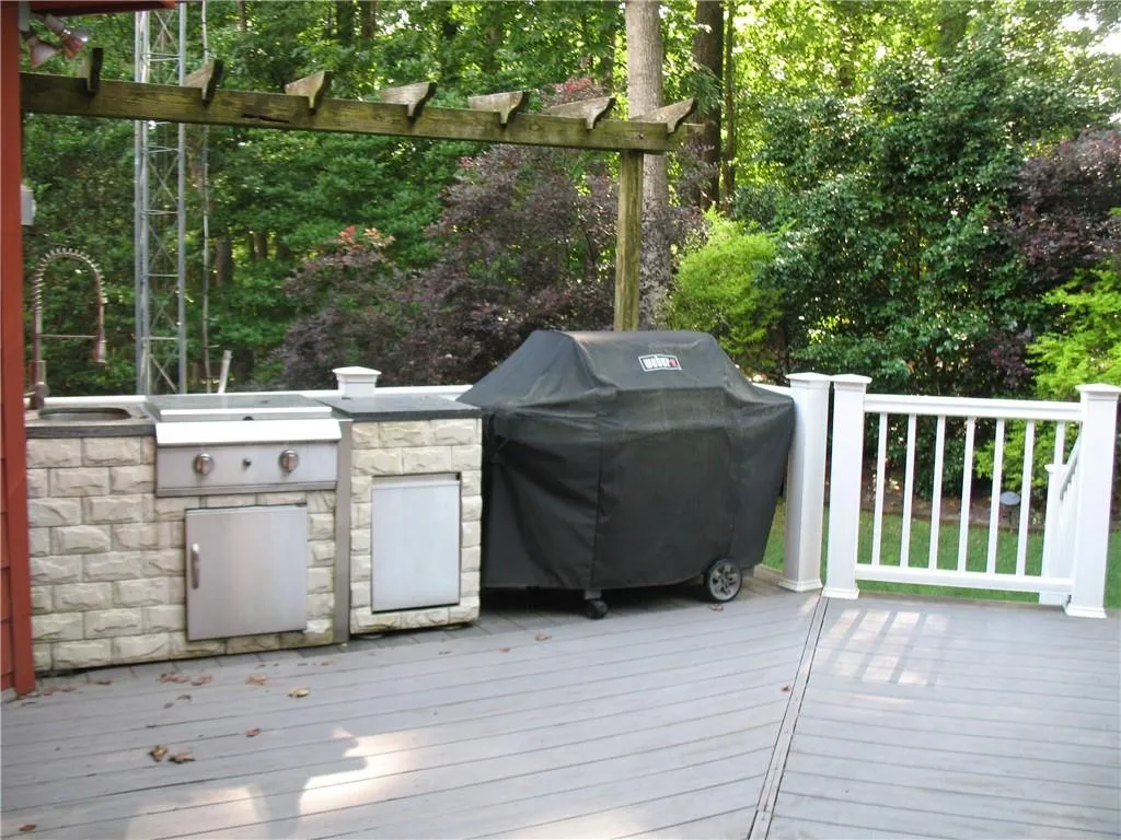 Large deck with outdoor kitchen