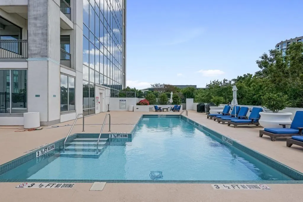 View of swimming pool with a patio area