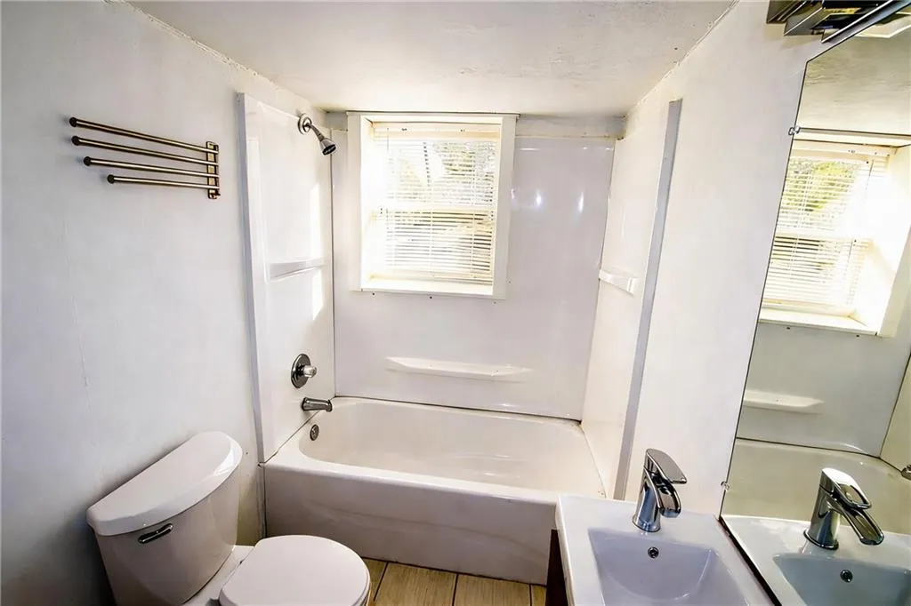 Full bathroom with vanity and bathtub / shower combination