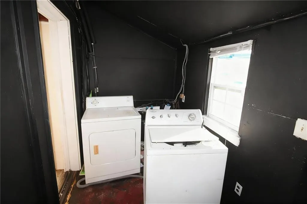 Laundry area featuring separate washer and dryer
