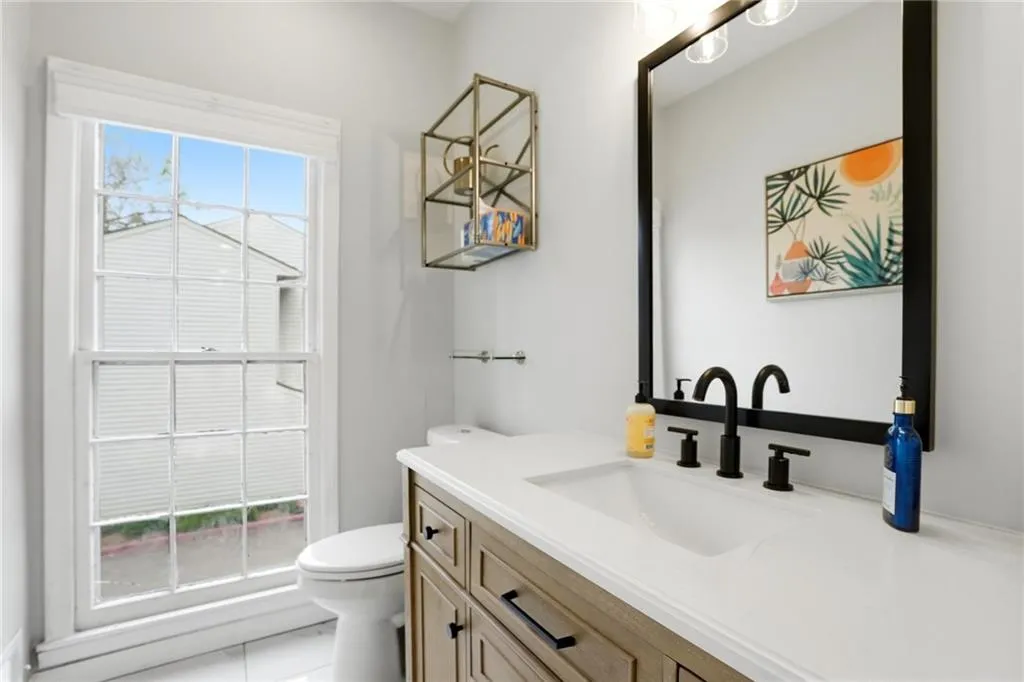 Bathroom with vanity and toilet
