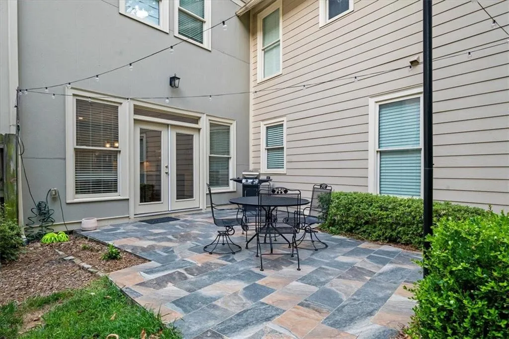 View of patio / terrace with outdoor dining area and french doors