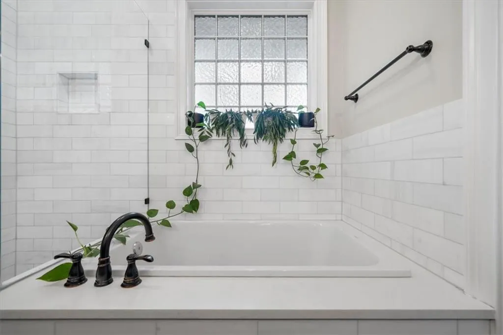 Full bathroom featuring a garden tub