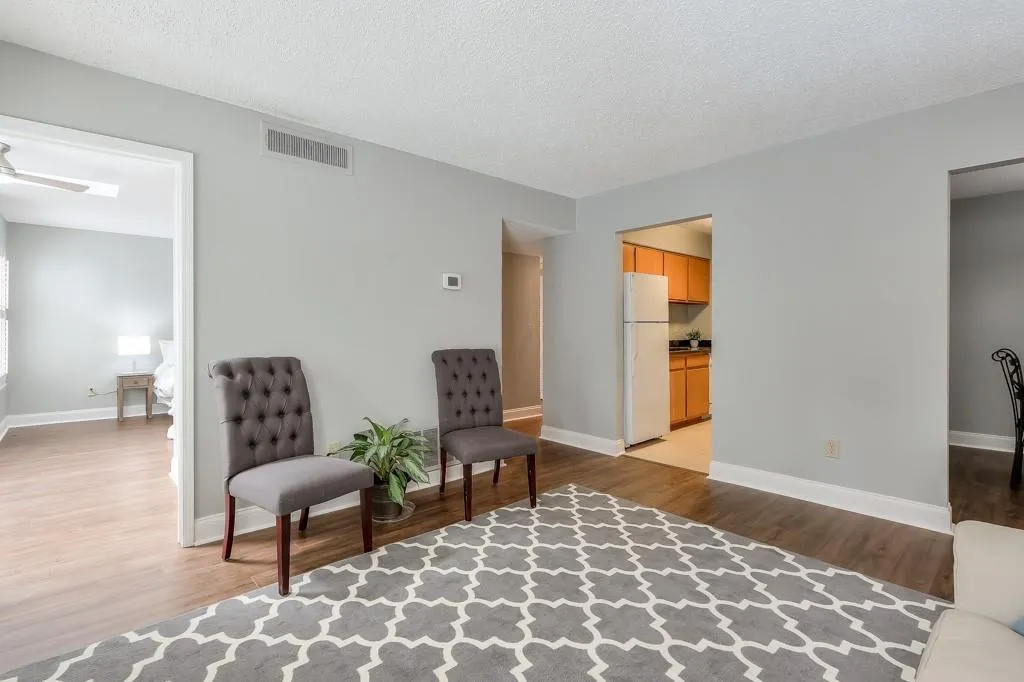 Living Room and Primary Bedroom